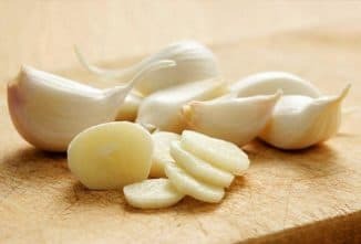 Treatment of sore throat with garlic
